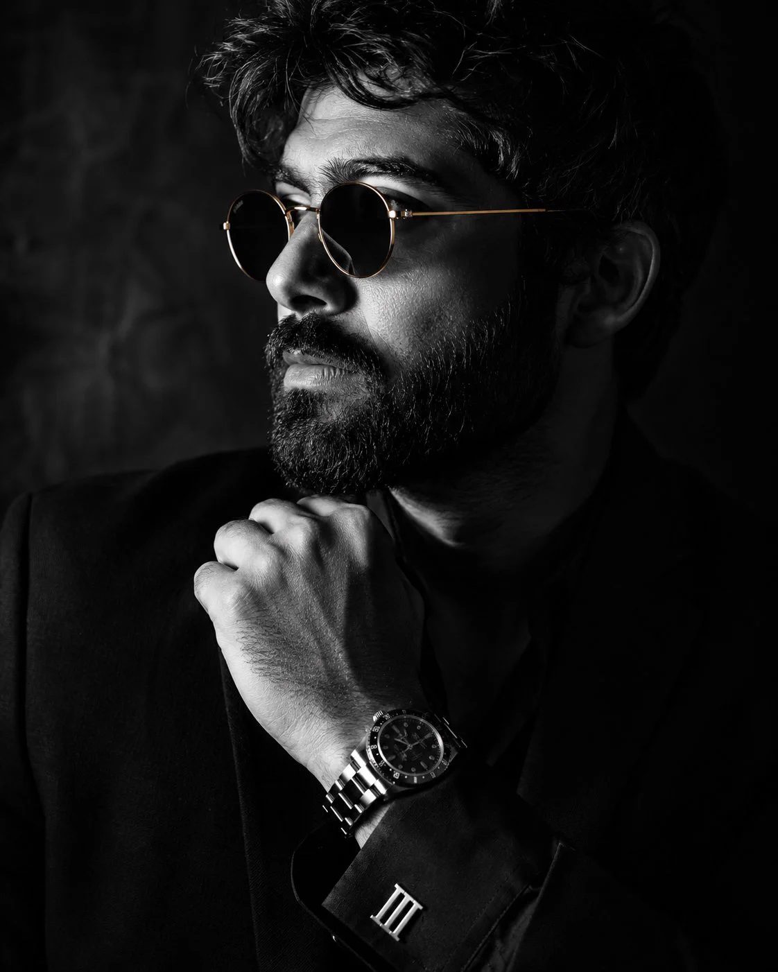 黑白男性 studio portrait with Rembrandt lighting + Roman numeral cuff